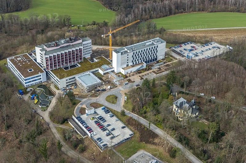 Aerial view, Ruhrlandklinik with construction site, Essen-Heidhausen, Essen, Ruhr area, North Rhine-Westphalia, Germany, construction work, construction area, construction site, building plots, construction project, construction site, DE, Europe, specialist clinic, healthcare, hospital, clinic, clinic centre, hospital, aerial view, aerial photography, aerial photography, medical facility, medical aid, new building, emergency service, Tüschener Weg, overview, bird's eye view, birds-eyes view, overview, medical care