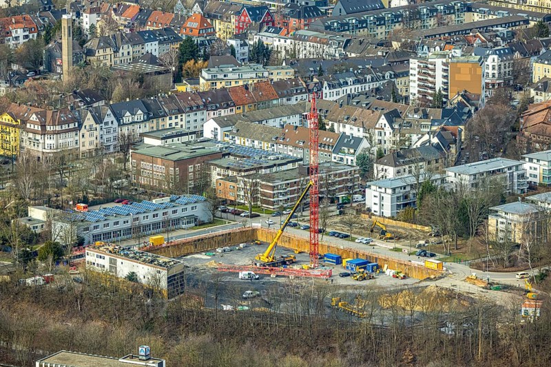 Aerial view, construction site, new building project residential development on the site of the Paas haulage company, formerly part of Langenbrahm colliery, Ursulastrasse corner Manfredstrasse, Essen-Rüttenscheid, Essen, Ruhr area, North Rhine-Westphalia, Germany, construction, construction crane, construction project, DE, Europe, aerial view, aerial photography, aerial photography, overview, bird's-eye view, overview