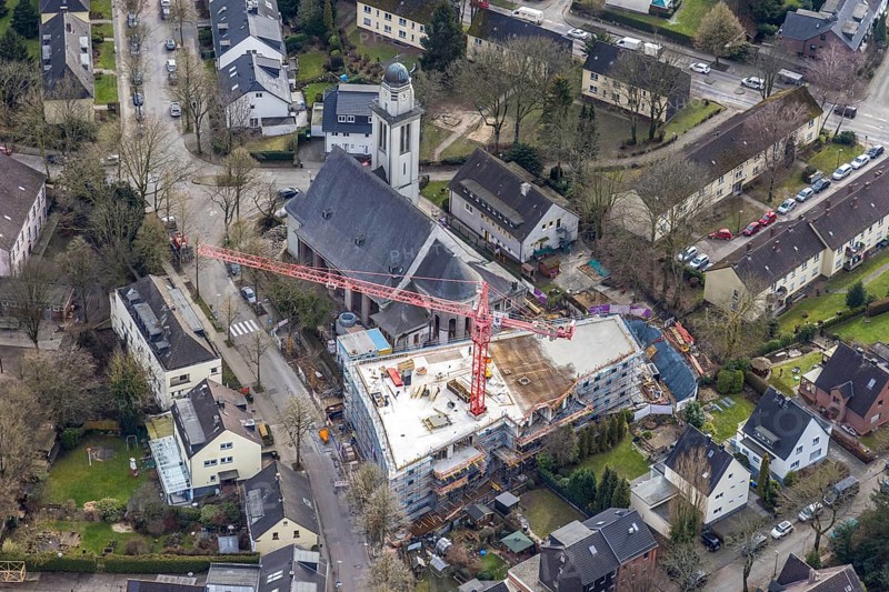 Aerial view, conversion of St. Mary's Church into flats and new construction for flats, Essen-Steele, Essen, Ruhr area, North Rhine-Westphalia, Germany, construction work, construction, construction area, building site, building plots, construction crane, construction project, construction site, Buschstraße, DE, Europe, property tax, real estate, church, aerial view, aerial photography, aerial photography, new construction, overview, bird's eye view, living and living, residential buildings, quality of living, residential neighbourhood, living space, birds-eyes view, overview