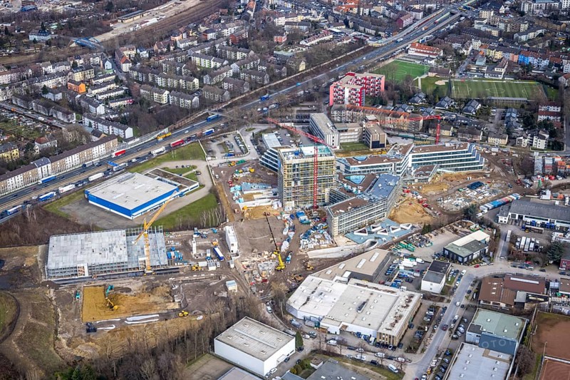 Aerial view, new construction ALDI-Nord Campus, Eckenbergstraße / Am Luftschacht, Essen-Kray, Essen, Ruhr area, North Rhine-Westphalia, Germany, construction work, construction area, building site, building plots, construction crane, construction measure, construction project, construction site, Buderus branch Essen - Bosch Thermotechnik, DE, development, Europe, commercial enterprises, commercial area, commercial park, commercial site, commercial use, industrial site, capacity requirement, aerial view, aerial photography, aerial photography, new construction, overview, bird's-eye view, overview