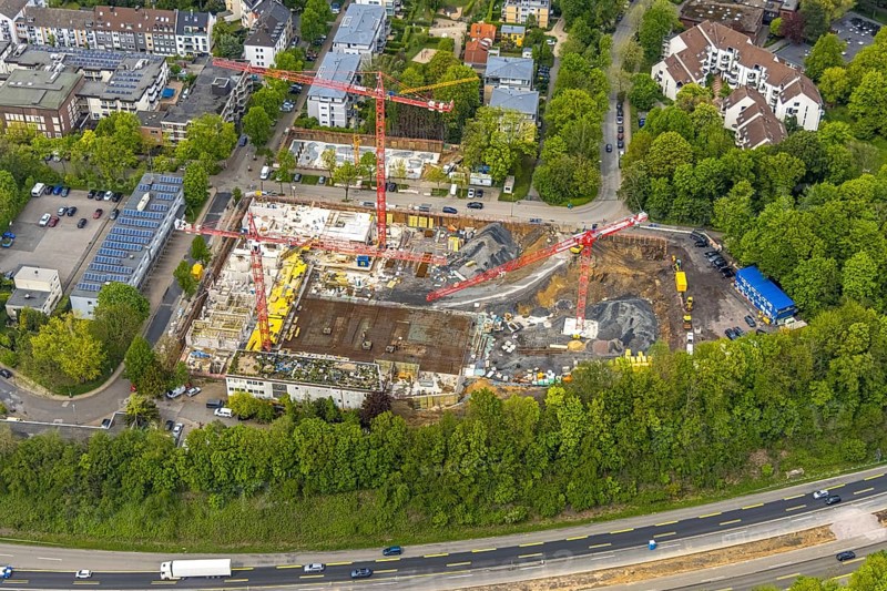 Aerial view, construction site multi-family houses Manfredstraße at the motorway A52, Essen-Rüttenscheid, Essen, Ruhr area, North Rhine-Westphalia, Germany, construction work, construction area, construction site, building plots, construction project, construction site, DE, Europe, fire station, fire brigade, aerial view, aerial photography, aerial photography, multi-family houses, apartment buildings, new construction, photovoltaic, photovoltaic system, solar, solar system, solar energy, solar energy, overview, bird's eye view, birds-eyes view, overview