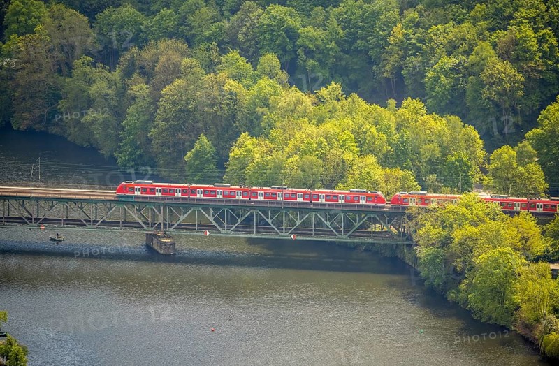 Aerial view, river Ruhr and suburban railway on the railway bridge Kettwig, Kettwig, Essen, Ruhr area, North Rhine-Westphalia, Germany, bridge, DE, Europe, river Ruhr, aerial view, aerial photography, aerial photography, suburban railway, overview, bird's eye view, train, birds-eyes view, overview