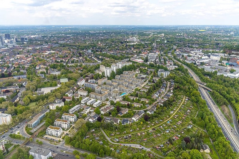Aerial view, new construction Parc Dunant, residential neighbourhood, Henri-Dunant-Straße, allotment garden Vöcklinger Feld, Essen-Rüttenscheid, Essen, Ruhr area, North Rhine-Westphalia, Germany, construction area, building site, building plots, construction project, construction site, DE, development, Europe, property tax, high-rise buildings, real estate, capacity requirements, aerial view, aerial photography, aerial photography, new construction, new construction area, overview, bird's-eye view, growth, becoming and growing, residential complex, living and living, residential area, residential buildings, residential quality, residential neighbourhood, housing estate, birds-eyes view, overview
