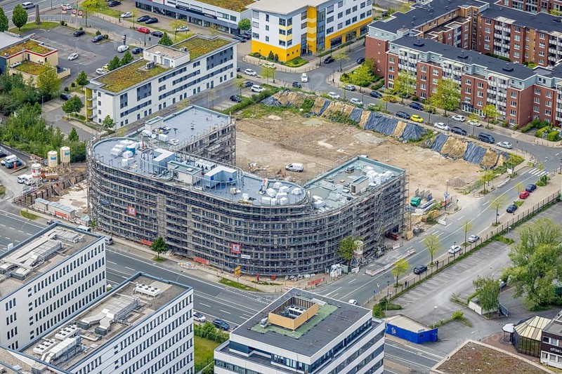 Aerial view, construction site and new office building on the corner of Frohnhauser Straße and Kurt-Jooss-Straße, City, Westviertel, Essen, Ruhr area, North Rhine-Westphalia, Germany, construction work, construction area, construction site, building plots, construction project, construction site, DE, Europe, aerial view, aerial photography, aerial photography, new building, overview, bird's-eye view, bird's-eye view, overview