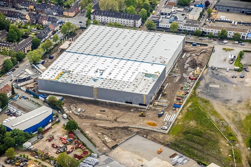 Aerial view, new building and construction site at the corner of Burggrafenstraße and Elisenstraße, Ostviertel, Essen, Ruhr area, North Rhine-Westphalia, Germany, construction work, construction area, building site, building plots, construction project, construction site, DE, Europe, aerial view, aerial photography, aerial photography, new building, overview, bird's-eye view, former coal mine, overview