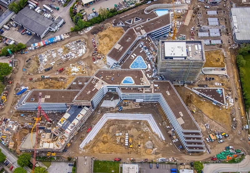 Aerial view, new construction and construction site ALDI-Nord Campus, in A-form, Eckenbergstraße, Hängebank, Essen-Kray, Essen, Ruhr area, North Rhine-Westphalia, Germany, construction work, construction area, building site, building plots, construction crane, construction project, construction site, DE, development, Europe, commercial enterprises, commercial area, industrial estate, commercial park, commercial site, commercial use, industrial site, aerial view, aerial photography, aerial photography, new construction, overview, bird's-eye view, birds-eyes view, overview