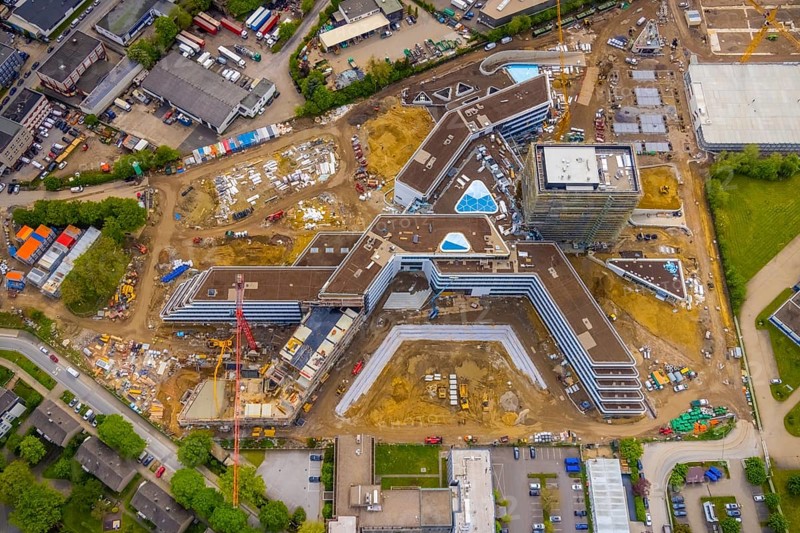 Aerial view, new construction and construction site ALDI-Nord Campus, in A-form, Eckenbergstraße, Hängebank, Essen-Kray, Essen, Ruhr area, North Rhine-Westphalia, Germany, construction work, construction area, building site, building plots, construction crane, construction project, construction site, DE, development, Europe, commercial enterprises, commercial area, industrial estate, commercial park, commercial site, commercial use, industrial site, aerial view, aerial photography, aerial photography, new construction, overview, bird's-eye view, birds-eyes view, overview