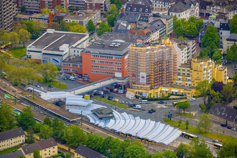 Aerial photo, construction site Kaiser-Otto-Residenz Essen, railway and bus station Steeler Platz, Essen-Steele, Essen, Ruhr area, North Rhine-Westphalia, Germany, retirement home, retirement home, station, construction work, construction area, building site, building plots, construction project, construction site, care and nursing, DE, Deutsche Bahn AG, Europe, main station, aerial view, aerial photography, aerial photography, care facility, S-Bahn, Scheidtmanntor, retirement home, retirement residence, retirement home, senior centre, overview, bird's eye view, ZOB, birds-eyes view, futuristic roofing, overview