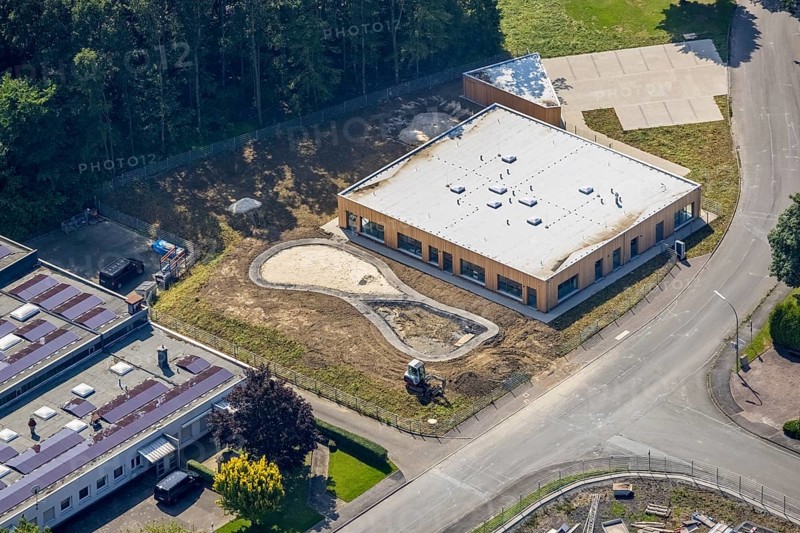Aerial view, industrial park Höingen, construction site for new kindergarten, Höingen, Ense, Sauerland, North Rhine-Westphalia, Germany, construction work, construction site, building plots, construction project, construction site, DE, Europe, commercial enterprises, commercial area, commercial area, commercial park, commercial site, commercial use, industrial area, industrial site, kindergarten, day-care centre, day-care centre for children, aerial view, aerial photography, aerial photography, new construction, overview, bird's-eye view, overview
