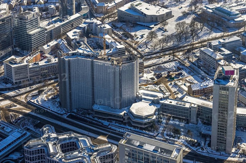 Aerial view, innogy high-rise building, construction site demolition RWE Haus, Westviertel, Essen, Ruhr area, North Rhine-Westphalia, Germany, demolition work, City, DE, Europe, Huyssenallee, city centre, aerial view, aerial photography, aerial photography, snow, city centre, overview, bird's eye view, winter, Ypsilon-Haus, birds-eyes view, overview