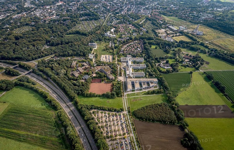 Aerial view, Westfälische Hochschule and Hans-Schwier-Berufskolleg in the district of Buer in Gelsenkirchen, Ruhr area, North Rhine-Westphalia, Germany, vocational school, education, educational institution, DE, Devesche Feld, Europe, Gelsenkirchen, community garden, college, KGV, allotment garden, allotment garden site, allotment garden association, allotment garden association recreation Buer, allotment gardener association, college school, teaching institute, aerial view, aerial photography, aerial photography, allotment garden, special school, overview, bird's eye view, housing estate Angerburger Straße, birds-eyes view, overview