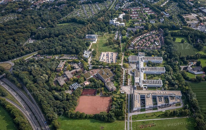 Aerial view, Westfälische Hochschule and Hans-Schwier-Berufskolleg in the district of Buer in Gelsenkirchen, Ruhr area, North Rhine-Westphalia, Germany, vocational school, education, educational institution, DE, Devesche Feld, Europe, Gelsenkirchen, community garden, college, KGV, allotment garden, allotment garden site, allotment garden association, allotment garden association recreation Buer, allotment gardener association, college school, teaching institute, aerial view, aerial photography, aerial photography, allotment garden, special school, overview, bird's eye view, housing estate Angerburger Straße, birds-eyes view, overview