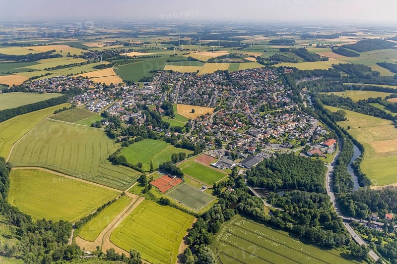 Aerial view, local view, Edeka supermarket local supply centre, sports field Niederense, Hubertushalle Schützenverein, river Möhne, Niederense, Ense, Sauerland, North Rhine-Westphalia, Germany, DE, Edeka supermarket, shopping markets, shopping place, shopping centre, Europe, football field, football stadium, aerial view, aerial photography, aerial photography, local supply centre, parking, Schützenbruderschaft, Schützenbruderschaft St. Hubertus 1824 Niederense, Schützenhalle, Schützenverein, sports, sports facilities, sports field, sports centre, supermarket, tennis, tennis facility, tennis courts, overview, bird's-eye view, overview