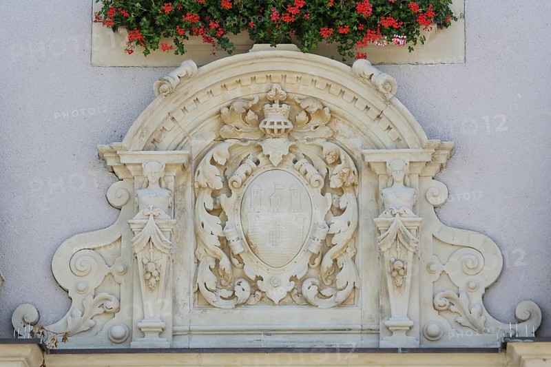 City coat of arms with decorations, relief, figures, town hall, market square, Schönebeck, Saxony-Anhalt, Germany