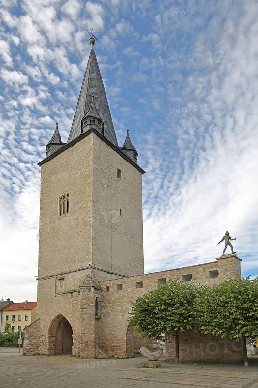 Gothic St John's Tower built in 1380 and monument to Adam Olearius by Bernd Göbel, landmark, city gate, city tower, sculpture, Aschersleben, Harz, Saxony-Anhalt, Germany