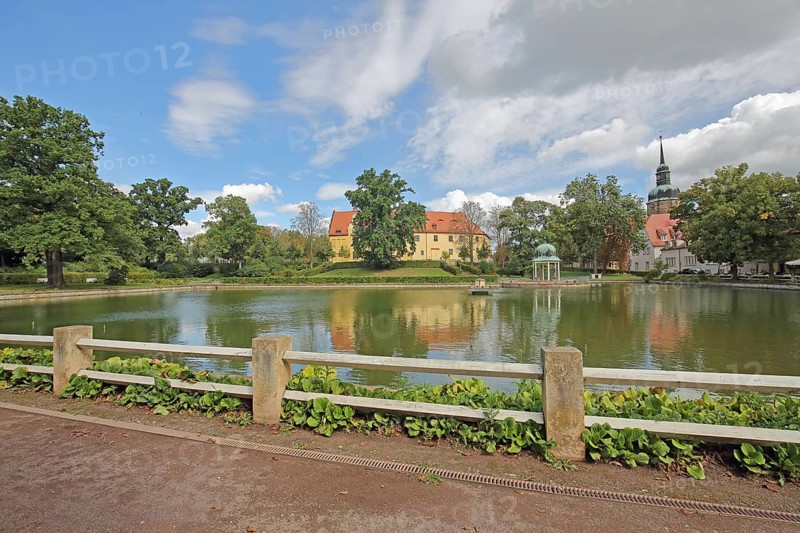Castle and pavilion at the spa park pond with church tower of the town church, Goethe School, Goethe Park, Bad Lauchstädt, Saxony-Anhalt, Germany