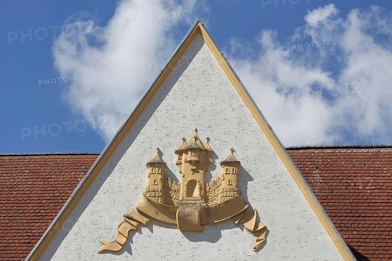 Town coat of arms in relief on the gable of the town hall, Barby, Saxony-Anhalt, Germany