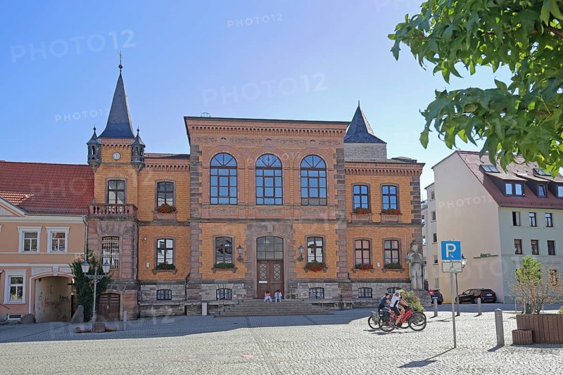 Town hall built in 1876, cyclist, market square, Calbe, Saxony-Anhalt, Germany
