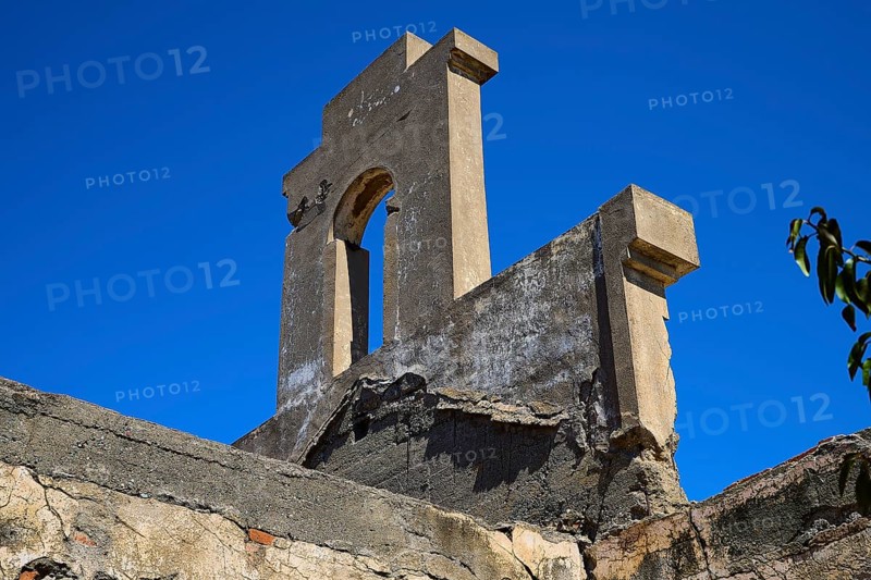 Tower-like structure with crumbling façade in front of a clear blue sky, Old Silk Factory, German Wehrmacht military prison, concentration camp, Lost Place, Kattavia, Rhodes, Dodecanese, Greek Islands, Greece