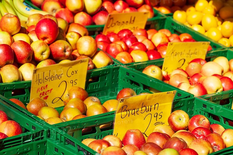 Fresh apples in crates with price tag on a market stall, Bremen, Germany