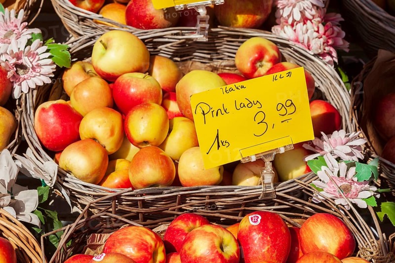 Fresh apples and fresh fruit with price tags in baskets in front of a greengrocer's shop, Bremen, Germany