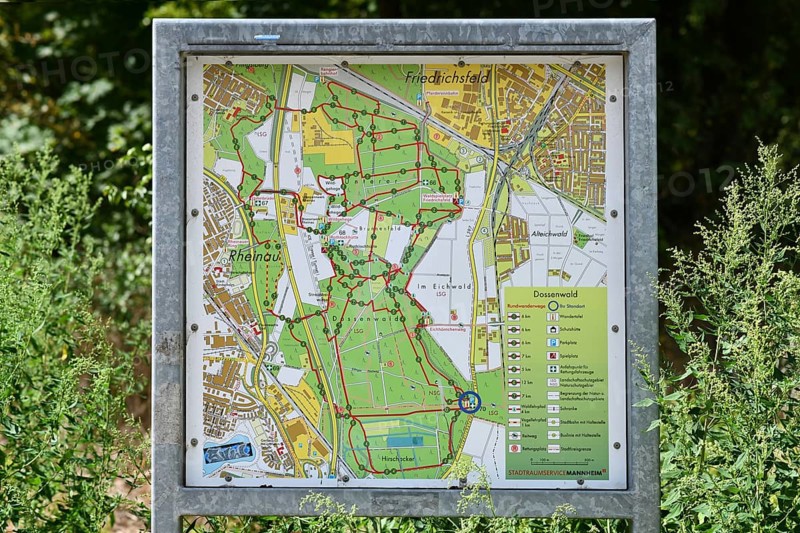 Mannheim, Germany - August 31st 2025: Information sign with map of Dossenwald forest in Mannheim