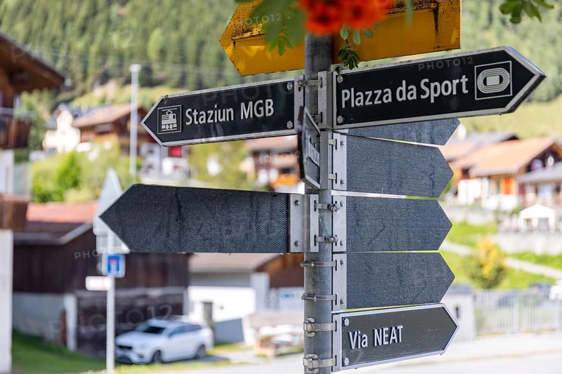 Signpost in the village to the museum, Via NEAT, church, Sedrun, Surselva, Graubünden, Switzerland