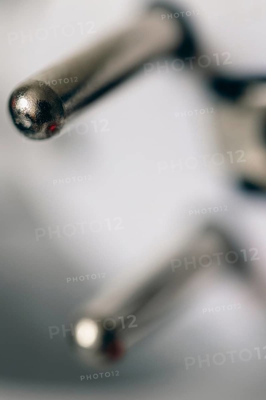 Close-up of a power plug, Schuko plug, with focus on the contact pins, symbol image for, electricity, electrical energy, power consumption, studio shot, Germany