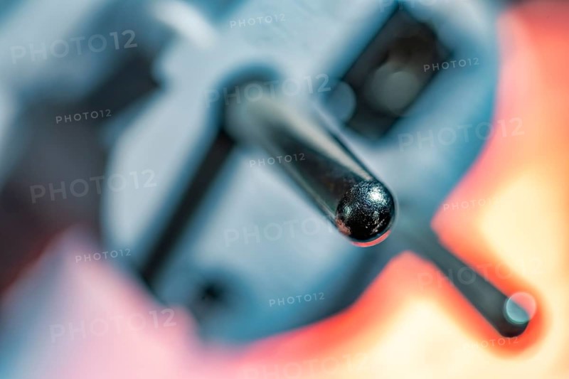 Close-up of a power plug, Schuko plug, with focus on the contact pins, symbol image for, electricity, electrical energy, power consumption, studio shot, Germany