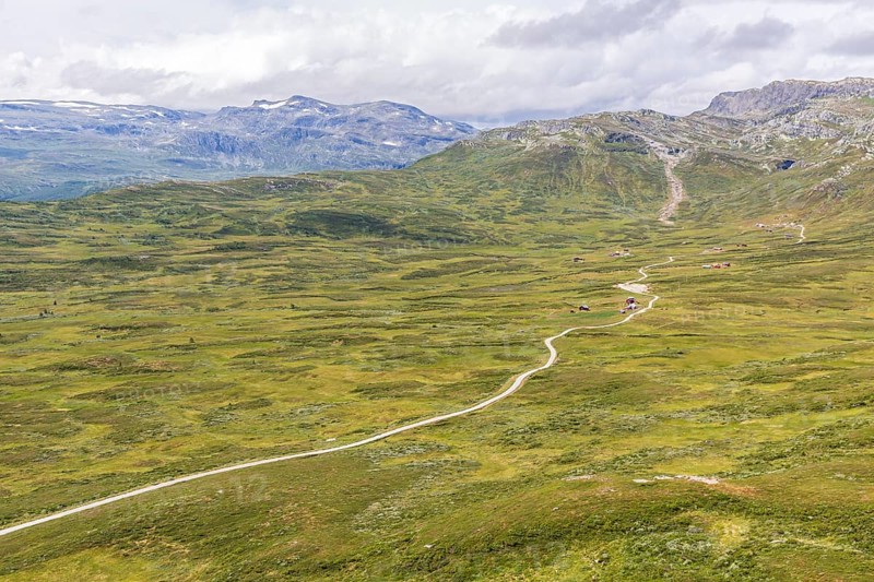 Gravel road through Jotunheimen National Park, view from Smørkollen mountain, Beitostølen, Innlandet, Norway