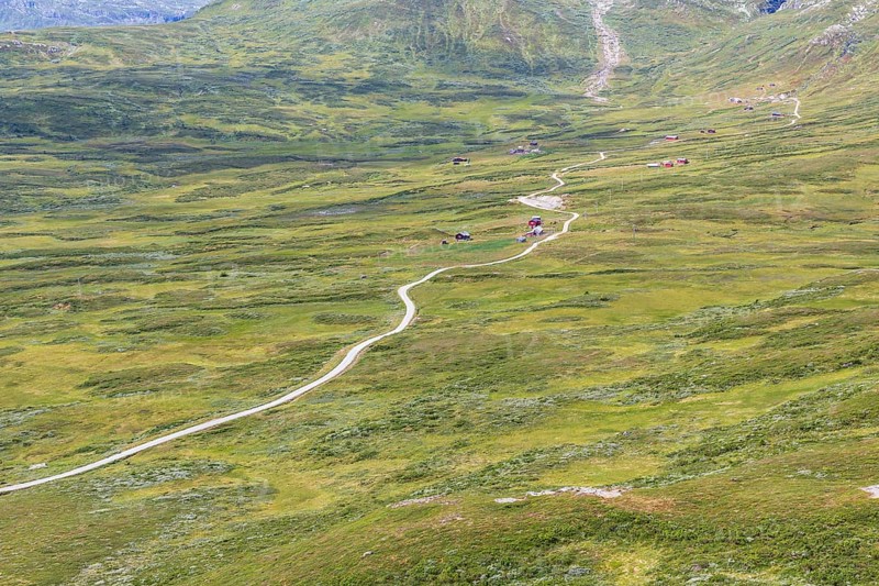 Gravel road through Jotunheimen National Park, view from Smørkollen mountain, Beitostølen, Innlandet, Norway