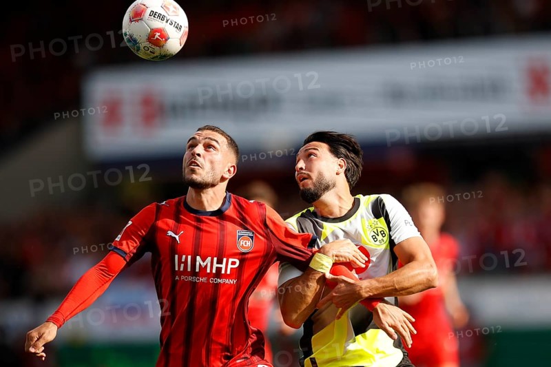 Football, Bundesliga 1, Matchday 3, 2025/2026, 1. FC Heidenheim vs. Borussia Dortmund, 13/09/2025, Voith-Arena, Heidenheim, Germany, Arijon IBRAHIMOVIC 1. FC Heidenheim 22 left in duel with Ramy BENSEBAINI Borussia Dortmund 5