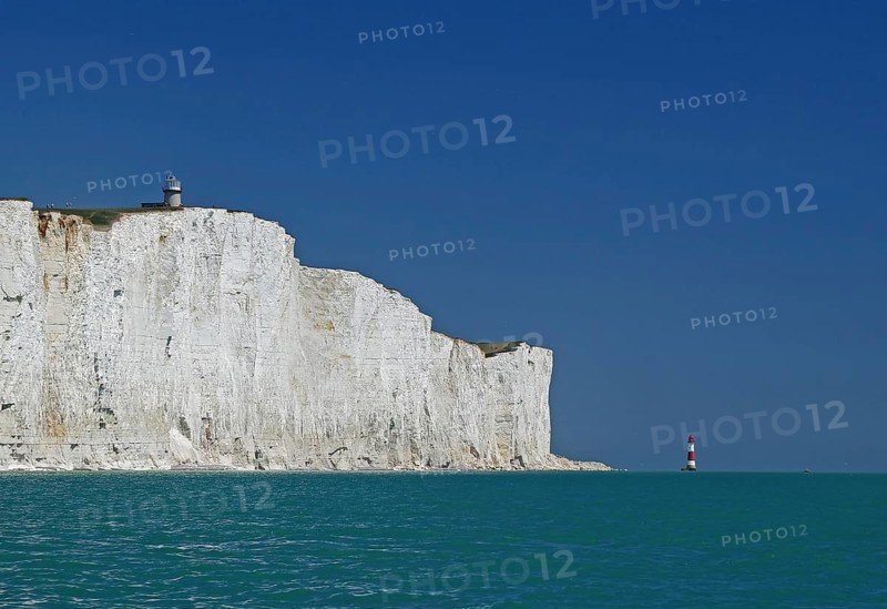 White cliffs with lighthouse under blue sky and turquoise sea, Beachy Head Lighthouse, Bournemouth, Dorset, England, Great Britain