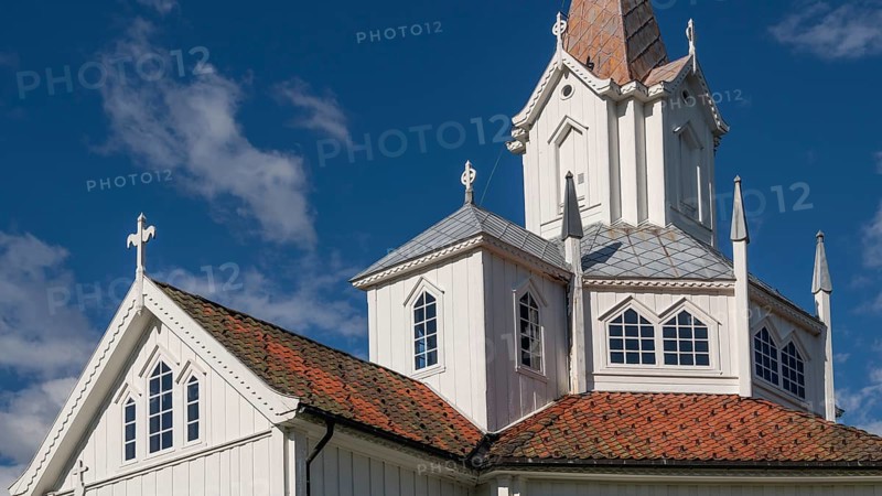 Close-up, white church building with tiled roofs, Tangen kirke or church, Olavsweg or Olavsleden, pilgrimage route, Tangen, Stange municipality, Norway