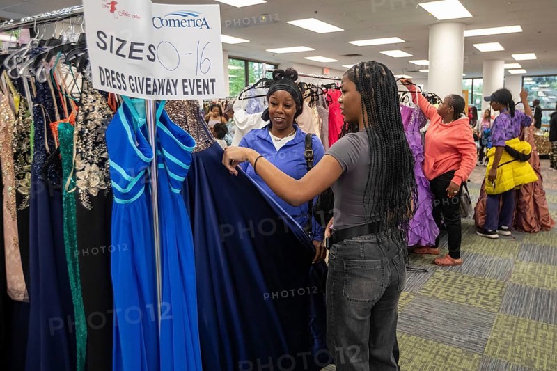 Detroit, Michigan USA - 13 September 2025 - High school students search for free homecoming dresses at a formal dress giveaway sponsored by Comerica Bank and the Jackets for Jobs nonprofit. The organizations expected to give away 500 dresses during the two-day event