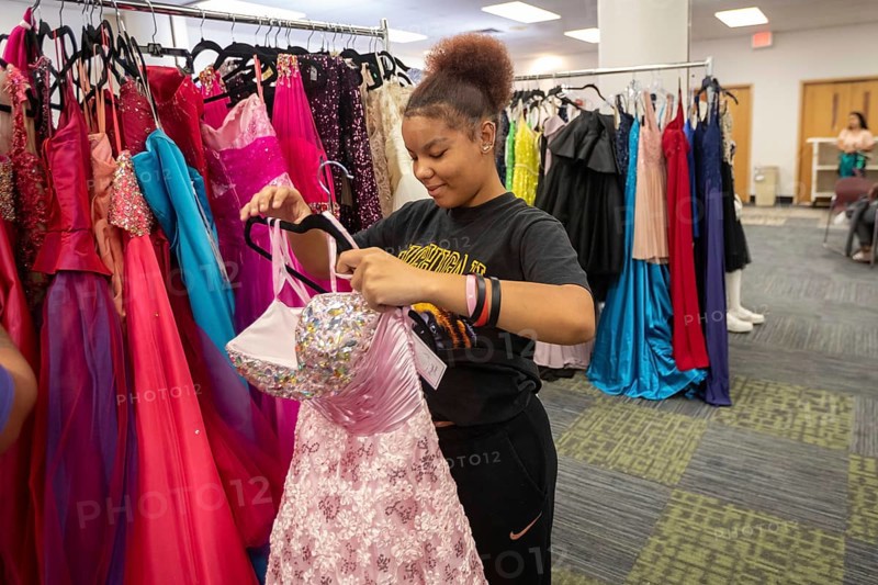 Detroit, Michigan USA - 13 September 2025 - High school students search for free homecoming dresses at a formal dress giveaway sponsored by Comerica Bank and the Jackets for Jobs nonprofit. The organizations expected to give away 500 dresses during the two-day event