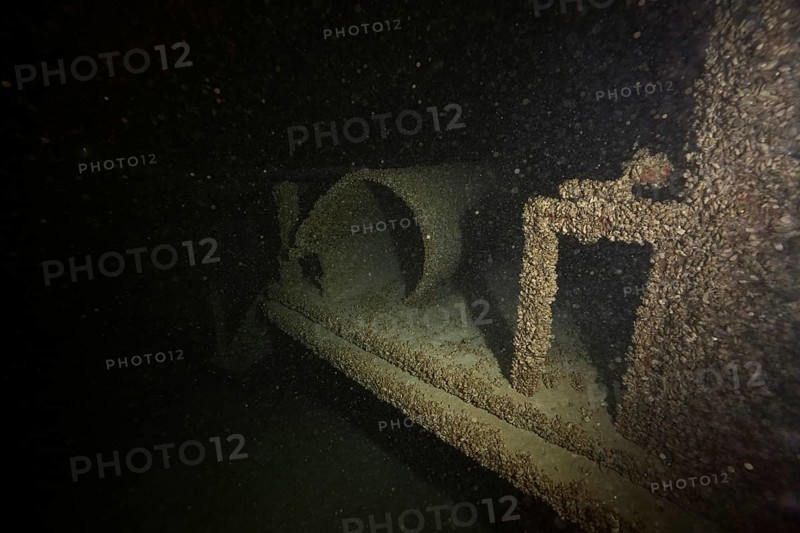 Dark shipwreck under water, heavily overgrown with quagga triangle mussels (Dreissena rostriformis bugensis), invasive species. Dive site wreck of the Jura, Lake Constance, Bottighofen, Switzerland, Münsterlingen, Germany