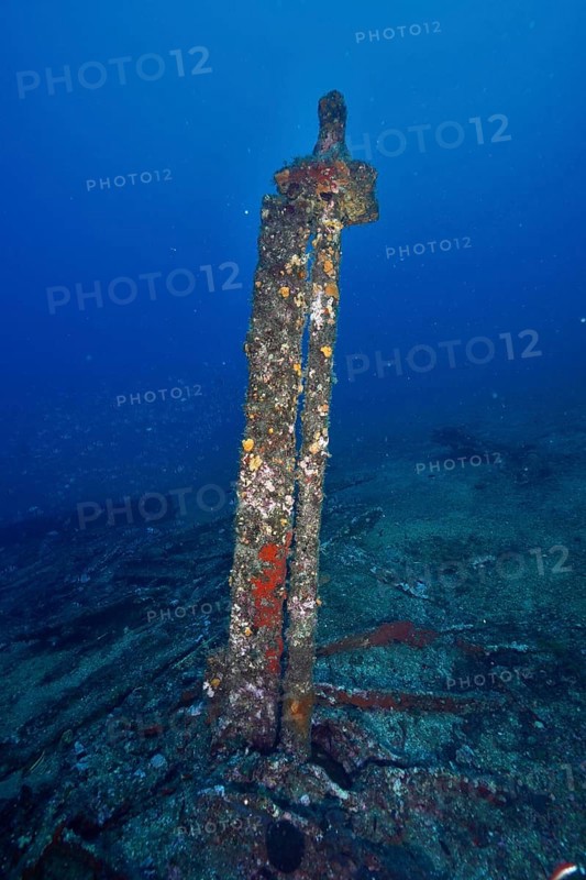 Old rusty part of a shipwreck standing on the seabed, surrounded by blue waters. Dive site wreck Le Vapeur, Giens peninsula, Provence Alpes Côte d'Azur, France