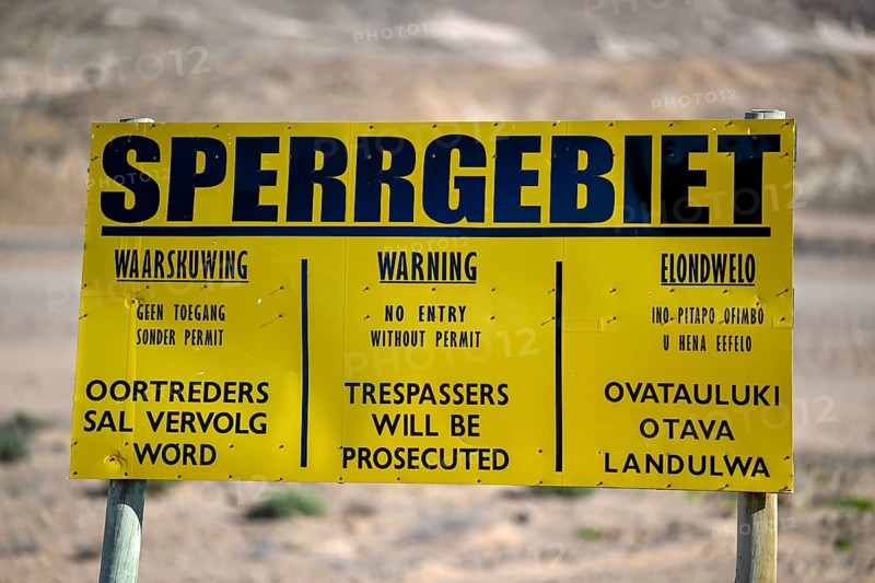 Restricted area sign, diamond restricted area, near Oranjemund, Karas region, Namibia
