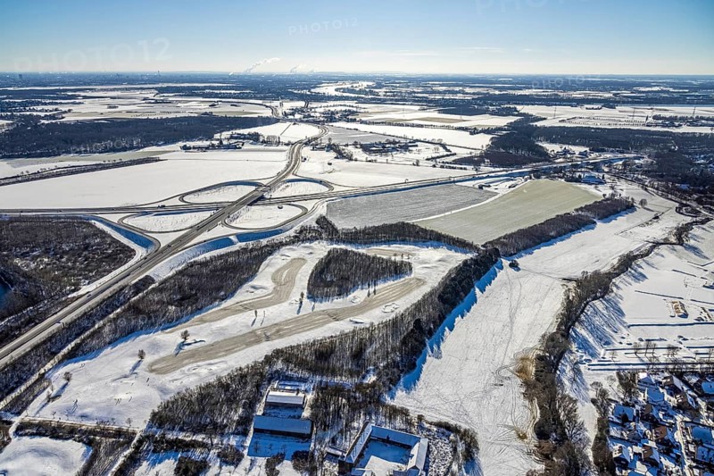 Aerial view, motorway junction Duisburg-Süd, A59 and A524, Huckingen, Duisburg, Ruhr area, North Rhine-Westphalia, Germany, motorway, DE, Europe, aerial view, aerial photography, aerial photography, snow, overview, bird's eye view, winter, birds-eyes view, cleared roads, overview