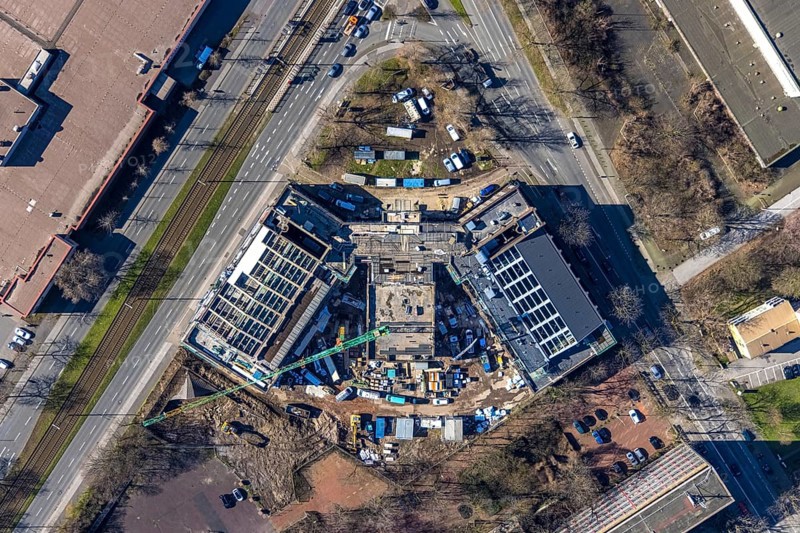 Aerial view, construction site for planned office building, former Hamborn municipal swimming pool, corner Duisburger Straße, Walther-Rathenau-Straße, Obermarxloh, Duisburg, Ruhr area, North Rhine-Westphalia, Germany, construction work, construction, construction area, construction site, building plots, construction crane, construction project, construction site, DE, Europe, aerial view, aerial photography, aerial photography, new building, municipal swimming pool, overview, bird's eye view, birds-eyes view, overview