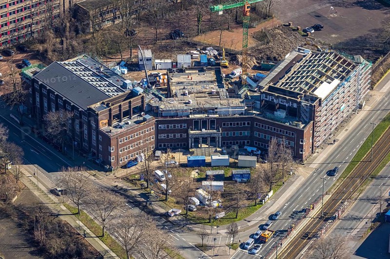 Aerial view, construction site for planned office building, former Hamborn municipal swimming pool, corner Duisburger Straße, Walther-Rathenau-Straße, Obermarxloh, Duisburg, Ruhr area, North Rhine-Westphalia, Germany, construction work, construction, construction area, construction site, building plots, construction crane, construction project, construction site, DE, Europe, aerial view, aerial photography, aerial photography, new building, municipal swimming pool, overview, bird's eye view, birds-eyes view, overview