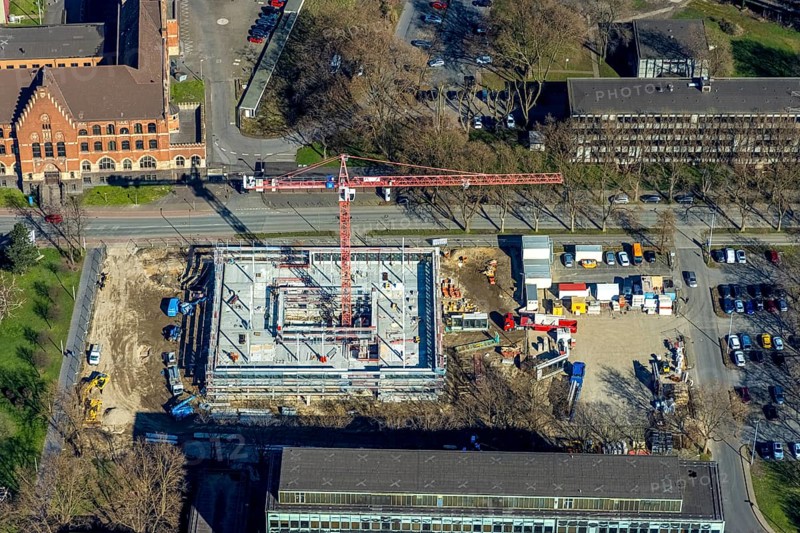 Aerial view, construction site new building on the administration site thyssenkrupp Steel Europe AG, Bruckhausen, Duisburg, Ruhr area, North Rhine-Westphalia, Germany, construction work, construction, construction area, construction site, building plots, construction crane, construction project, construction site, DE, Europe, Franz-Lenze-Straße, aerial view, aerial photography, aerial photography, new building, overview, bird's-eye view, bird's-eye view, overview