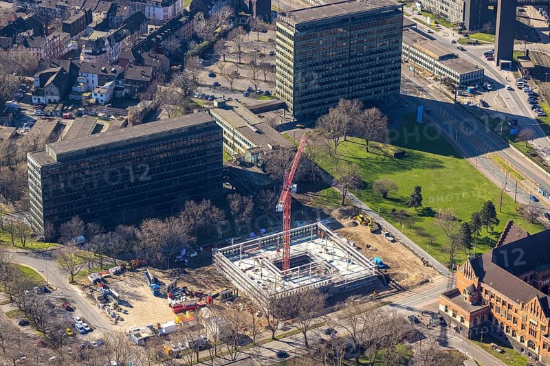 Aerial view, construction site new building on the administration site thyssenkrupp Steel Europe AG, Bruckhausen, Duisburg, Ruhr area, North Rhine-Westphalia, Germany, construction work, construction, construction area, construction site, building plots, construction crane, construction project, construction site, DE, Europe, Franz-Lenze-Straße, aerial view, aerial photography, aerial photography, new building, overview, bird's-eye view, bird's-eye view, overview