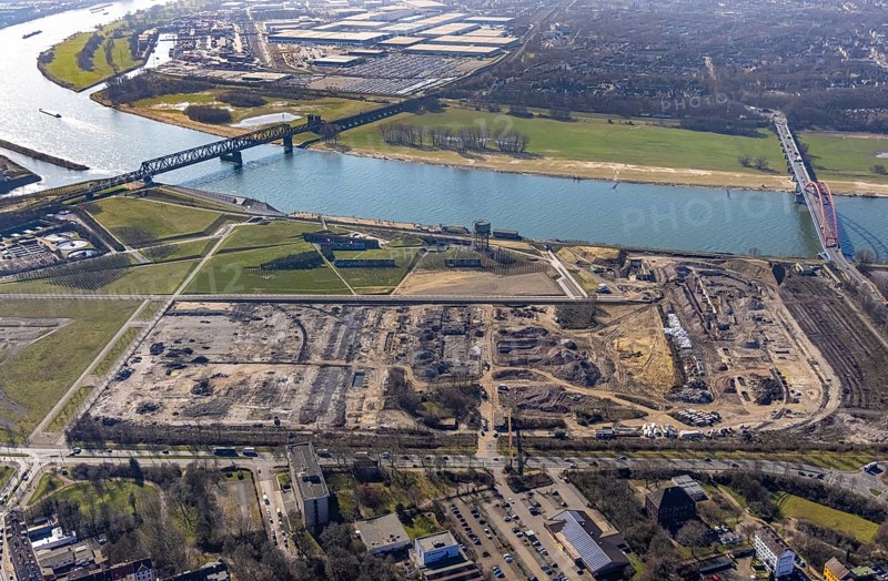 Aerial view, demolition of wire rolling mill for new construction RHEINORT quarter, construction area at Rheinpark Duisburg, Hochfeld, Duisburg, Ruhr area, North Rhine-Westphalia, Germany, construction work, construction, construction area, construction site, building plots, construction project, construction site, DE, Europe, aerial view, aerial photography, aerial photography, new construction, park, overview, bird's-eye view, overview