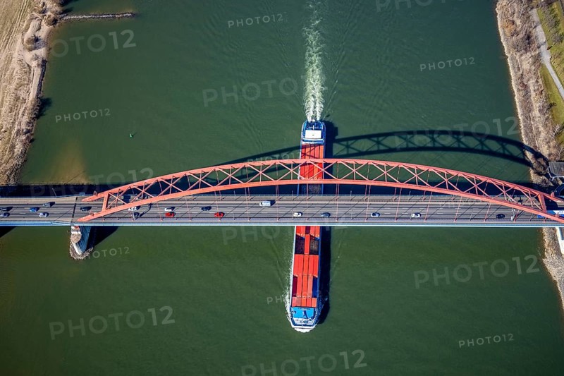 Aerial view, Bridge of Solidarity and container ship on the Rhine, Hochfeld, Duisburg, Ruhr area, North Rhine-Westphalia, Germany, inland navigation, container ships, DE, Europe, freight transport, freight traffic, logistics, aerial view, aerial photography, aerial photography, mortar road, shipping, shipping traffic, overview, bird's-eye view, overview