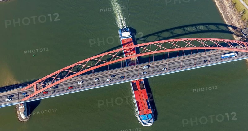 Aerial view, Bridge of Solidarity and container ship on the Rhine, Hochfeld, Duisburg, Ruhr area, North Rhine-Westphalia, Germany, inland navigation, container ships, DE, Europe, freight transport, freight traffic, logistics, aerial view, aerial photography, aerial photography, mortar road, shipping, shipping traffic, overview, bird's-eye view, overview