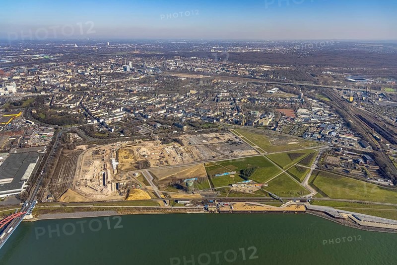 Aerial view, demolition of wire rolling mill for new construction RHEINORT neighbourhood, construction area at Rheinpark Duisburg, water tower Hochfeld, river Rhine, Hochfeld, Duisburg, Ruhr area, North Rhine-Westphalia, Germany, construction work, construction, construction area, construction site, construction project, construction site, DE, Europe, aerial view, aerial photography, aerial photography, new construction, park, overview, bird's-eye view, overview