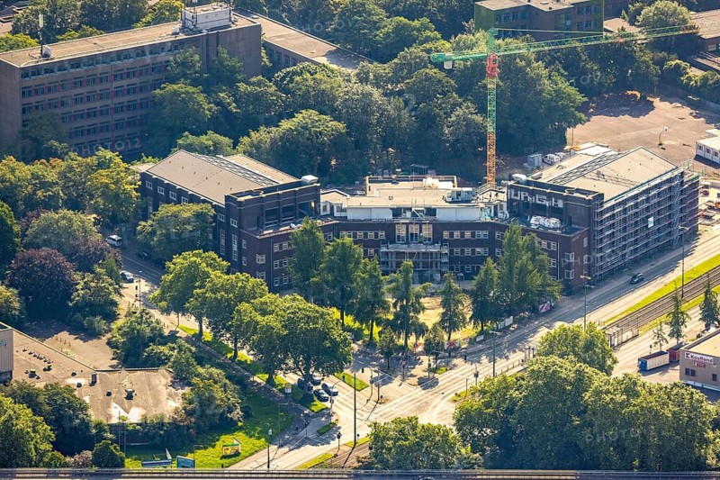 Aerial view, construction site for planned office building, former municipal swimming pool Hamborn, Duisburger Straße corner Walther-Rathenau-Straße, Obermarxloh, Duisburg, Ruhr area, North Rhine-Westphalia, Germany, construction work, construction area, construction site, building plots, construction project, construction site, DE, Europe, aerial view, aerial photography, aerial photography, new building, overview, bird's-eye view, birds-eyes view, overview
