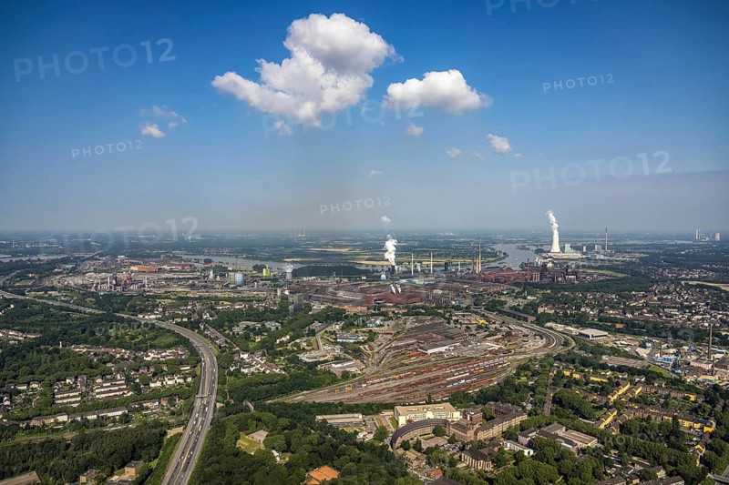 Aerial view, goods train station, thyssenkrupp Steel Europe factory premises, river Rhine with STEAG cogeneration plant Walsum, Marxloh, Duisburg, Ruhr area, North Rhine-Westphalia, Germany, DE, Europe, commercial enterprises, commercial area, commercial park, commercial site, commercial use, greenhouse, industrial area, industrial building, industrial site, power plant, aerial view, aerial photography, aerial photography, aerial photography, overview, bird's-eye view, birds-eyes view, overview